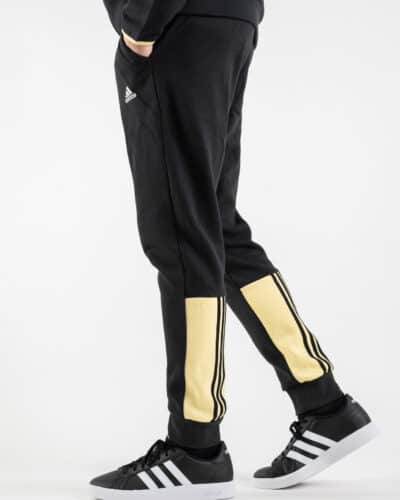 ADIDAS Pantalone tuta con logo HK446 Nero 7 ADIDAS ADIDAS Pantalone nero della tuta con logo e fasce gialle HK446