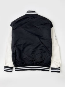 Bomber varsity in tessuto tecnico con maniche in ecopelle e applicazioni 3038 Nero-Bianco1