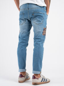 V2 Jeans azzurro slim con piccole rotture e patch laterali TOKYO Azzurro (6)